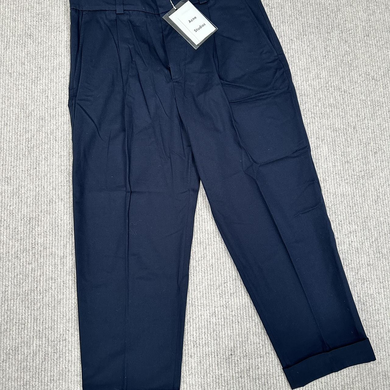 Navy chinos, ankle length, not worn, size 52,... - Depop