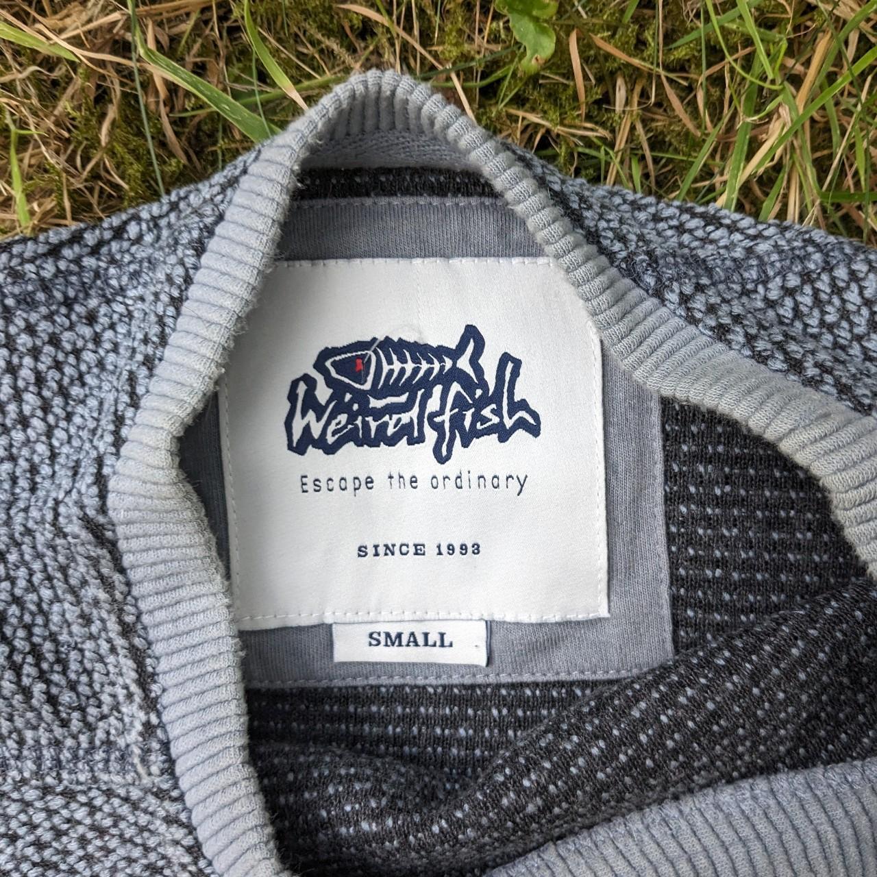 Grey weird fish sweater. This is a super high... Depop