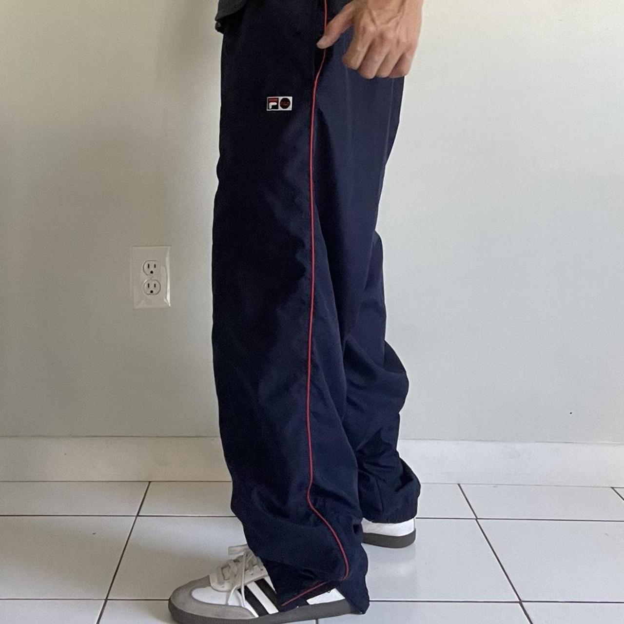 Fila Sport Sweatpants. Size medium, has a burn hole - Depop