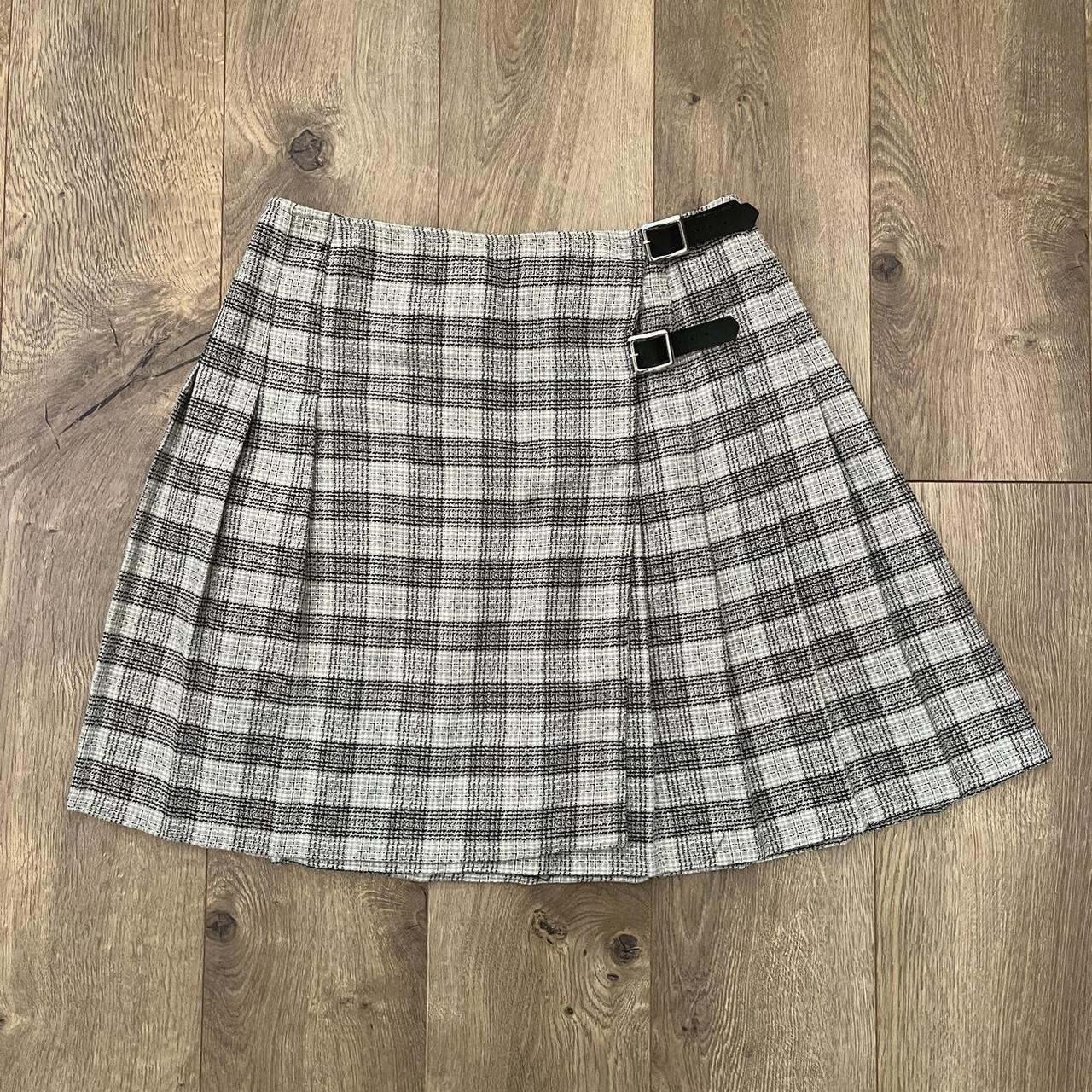 Vintage schoolgirl pleated mini skirt with buckle... - Depop