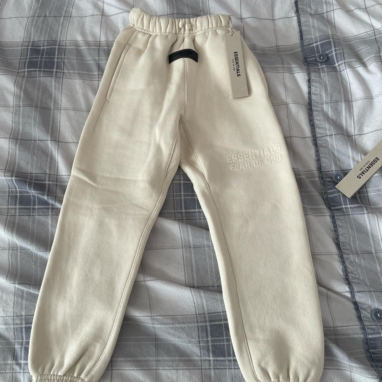 Fear of god essentials t shirt and joggers set , egg... - Depop