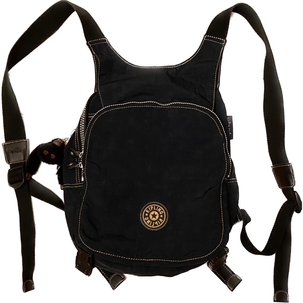 Navy Kipling backpack. Two bag design that clips at... Depop