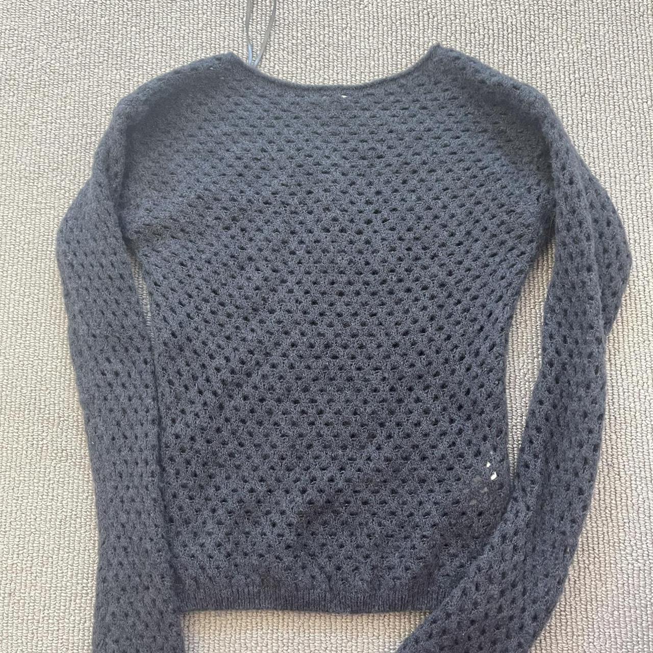 Subdued navy knit, one size, small holes like... - Depop