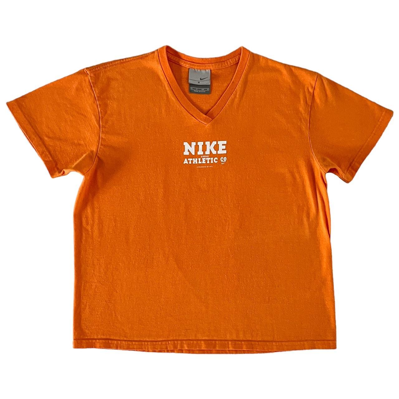 lime green and orange nike shirt