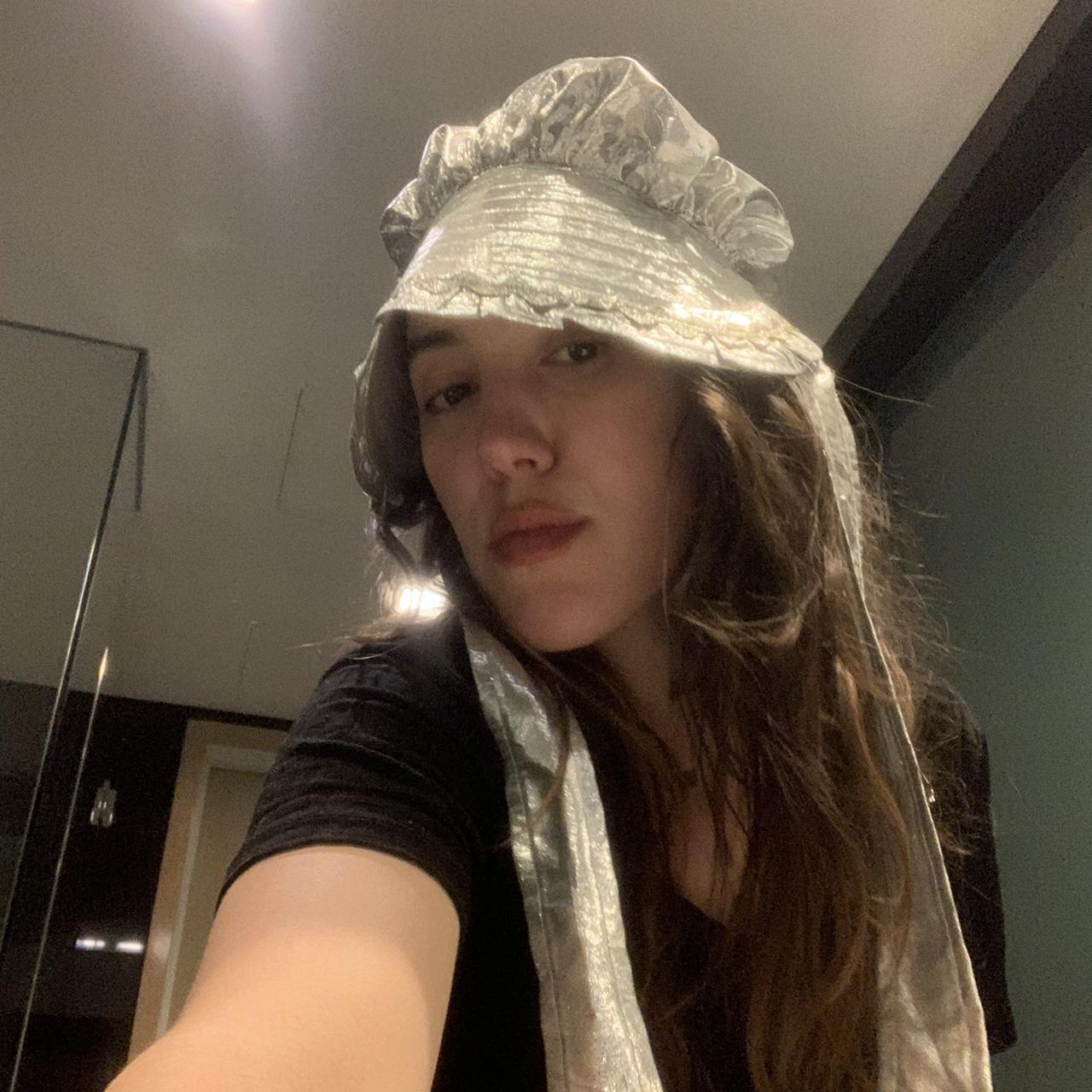 Las Vegas lightweight silver lame fabric bonnet.