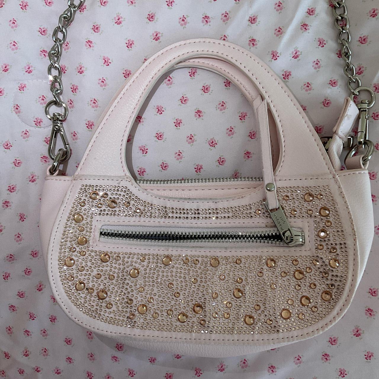 madden girl mini purse one side is bedazzled it s