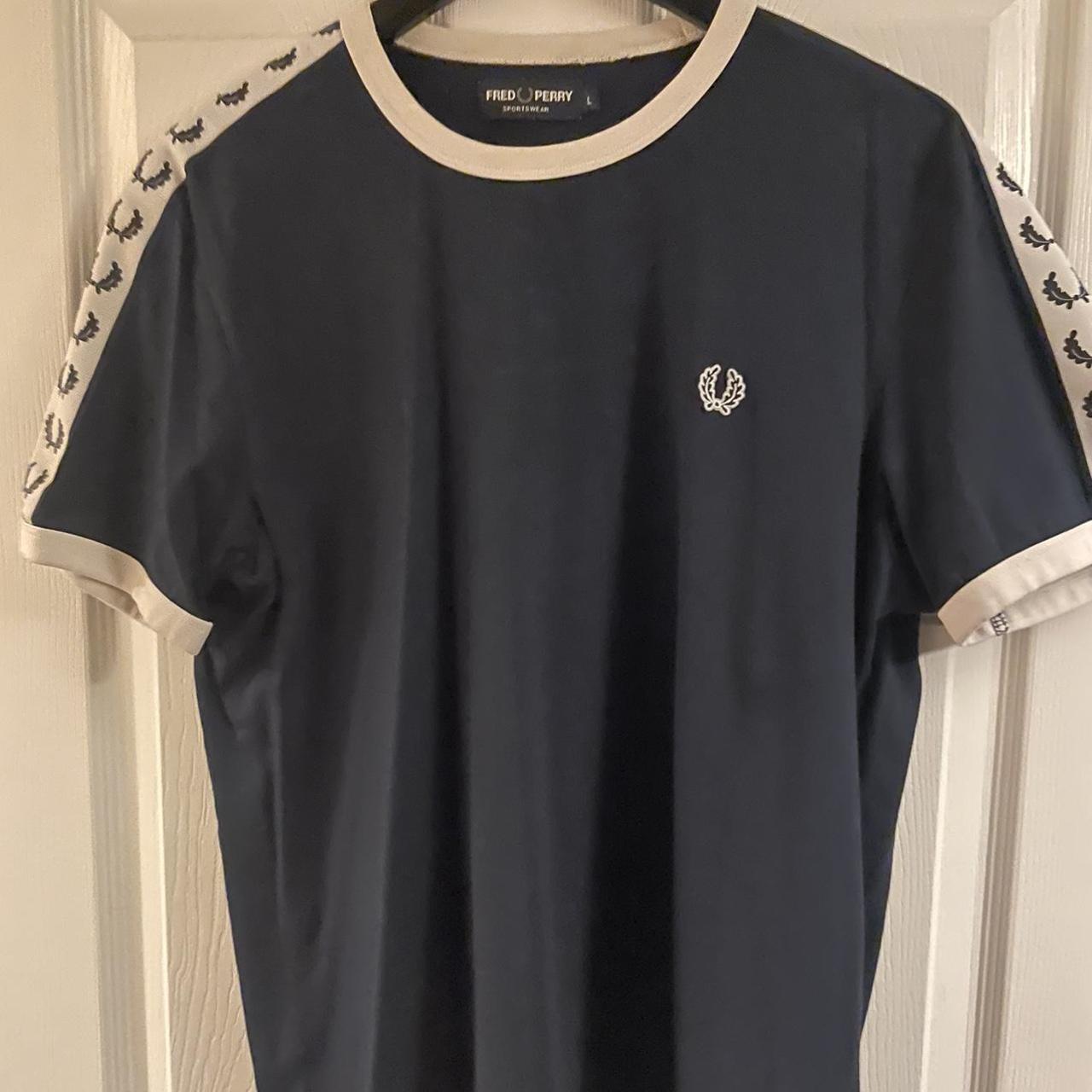 Fred Perry tshirt in navy blue. Very good used... - Depop