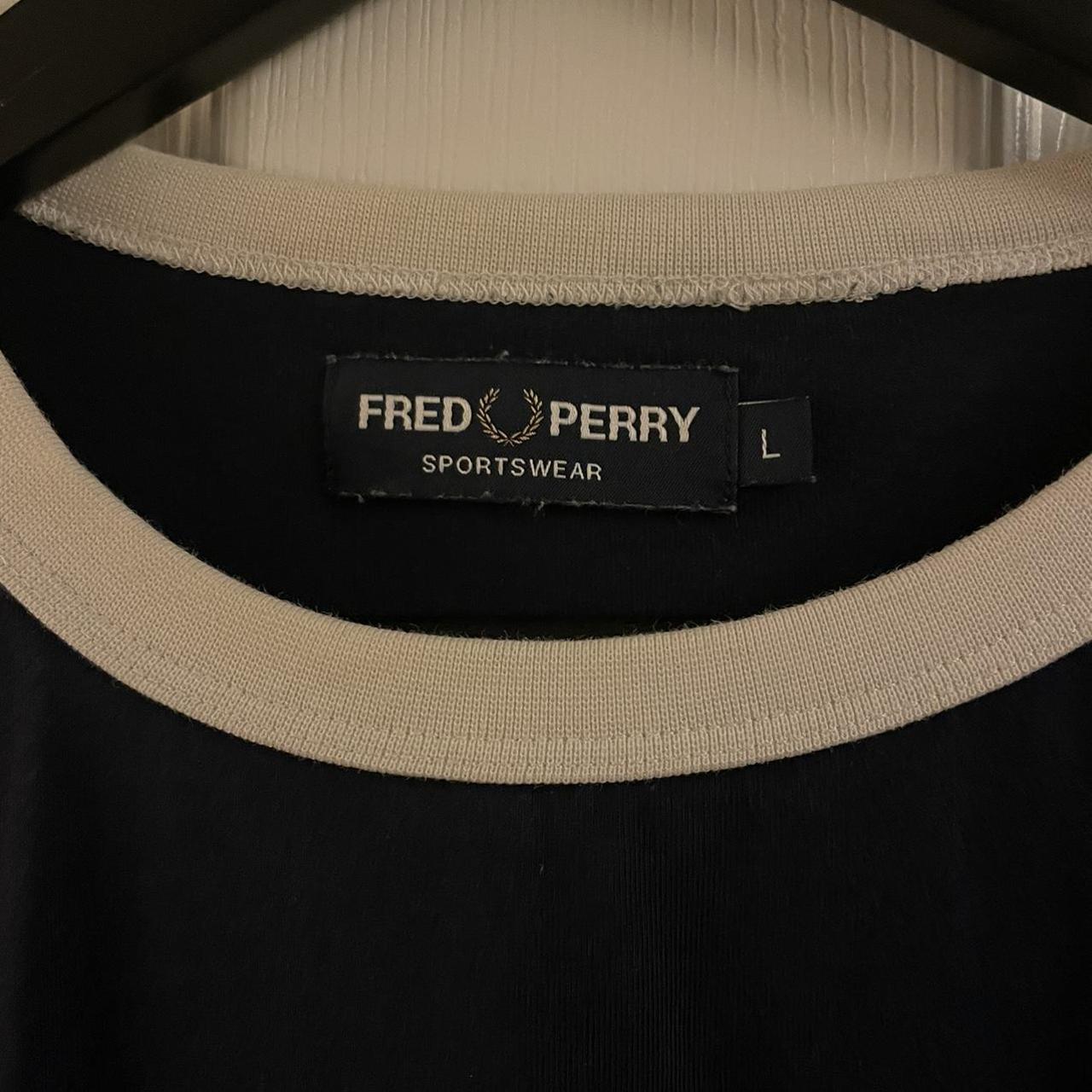 Fred Perry tshirt in navy blue. Very good used... - Depop