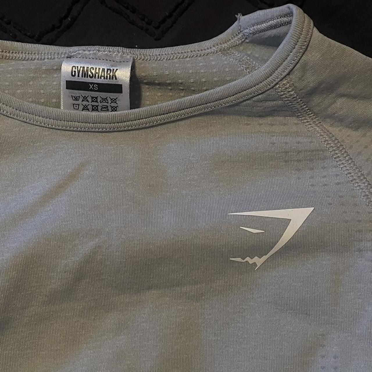 Gymshark workout top! Nice light gray color and... - Depop
