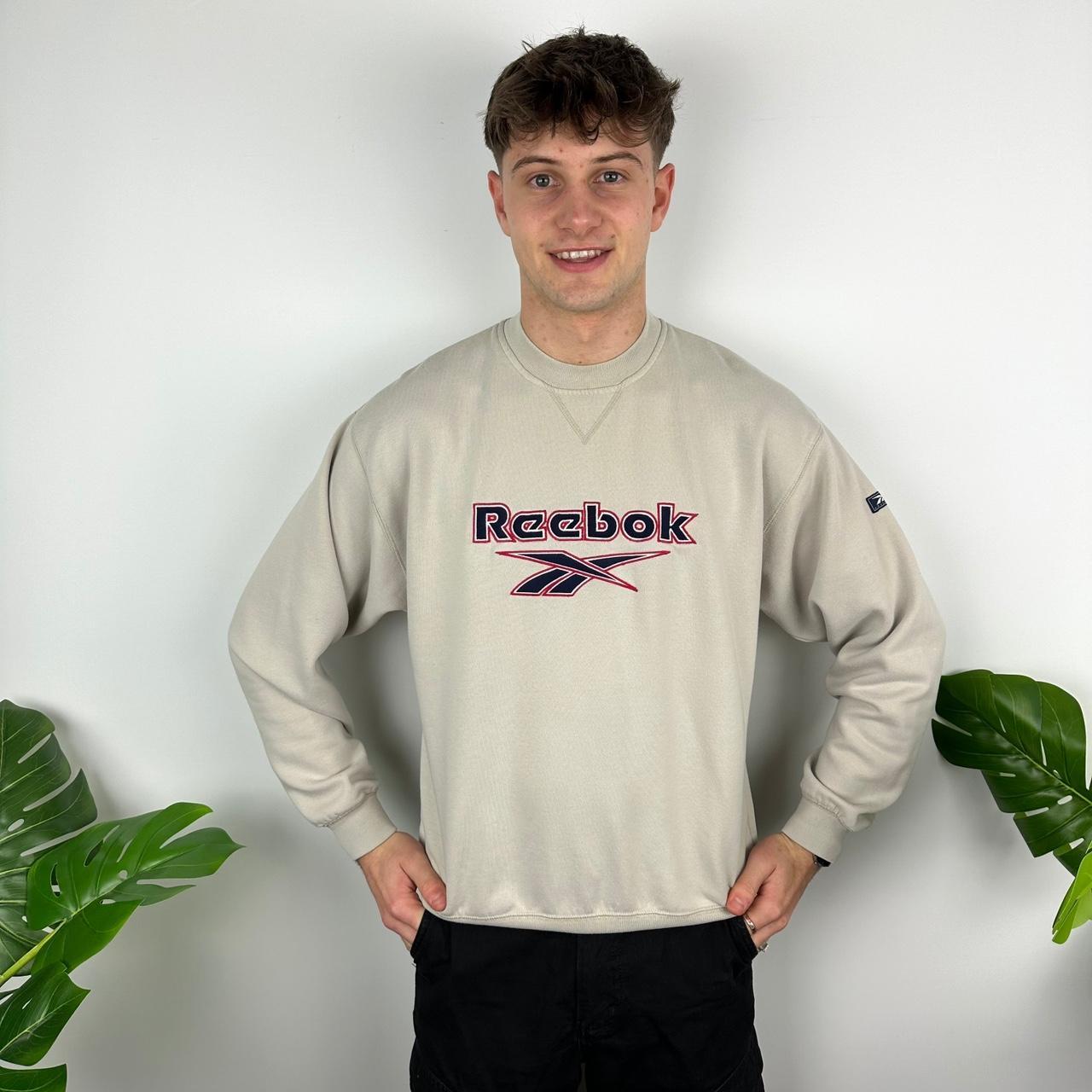 Cream best sale reebok sweatshirt