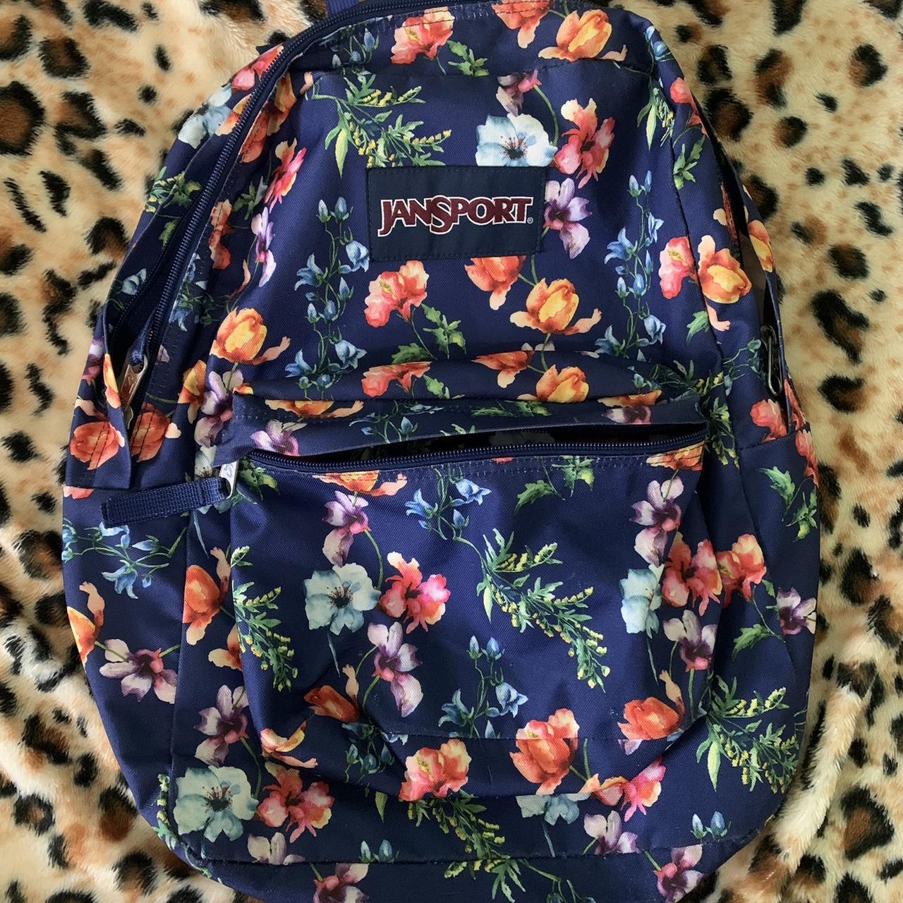 Jansport navy blue floral backpack All zippers. Depop