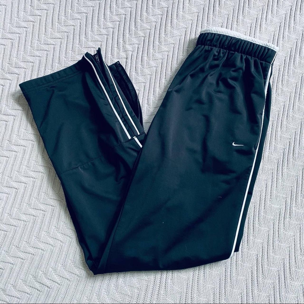 Nike black fleece lined athletic pants, size XL.... Depop