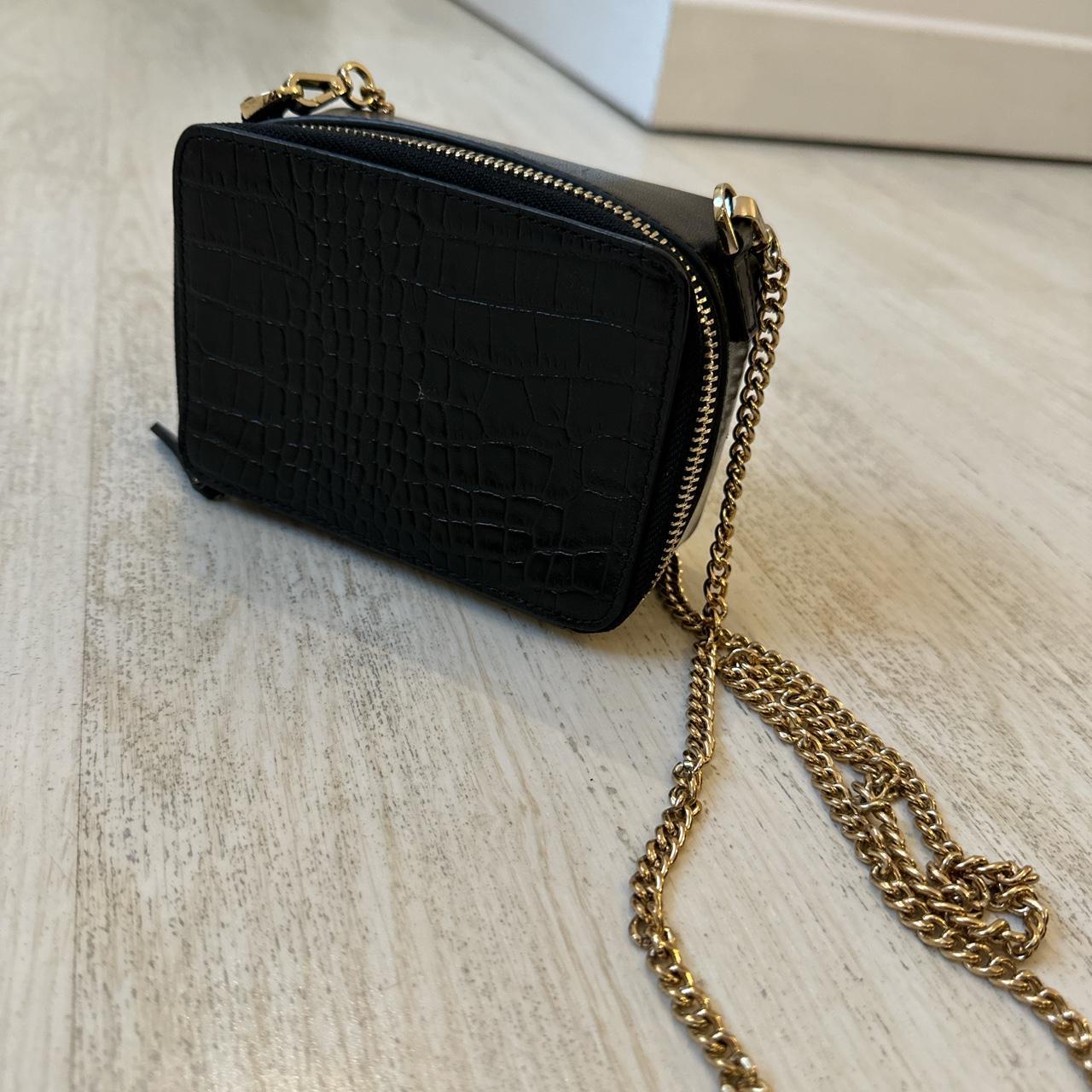 Whistles Women's Black and Gold Bag Depop
