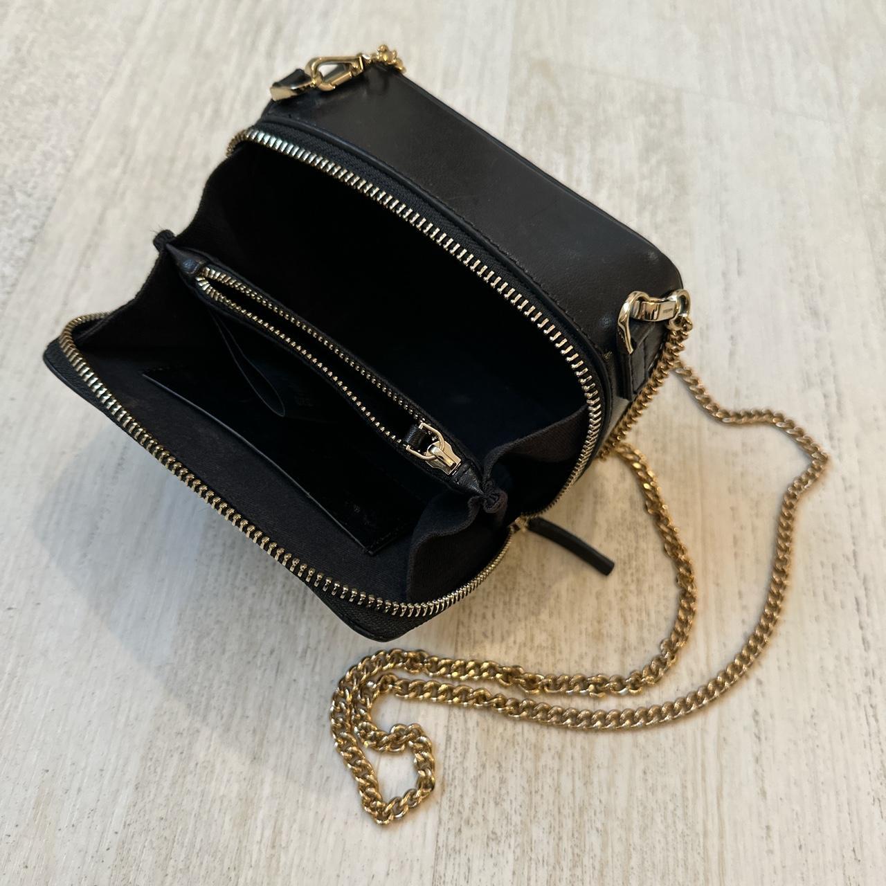 Whistles Women's Black and Gold Bag Depop