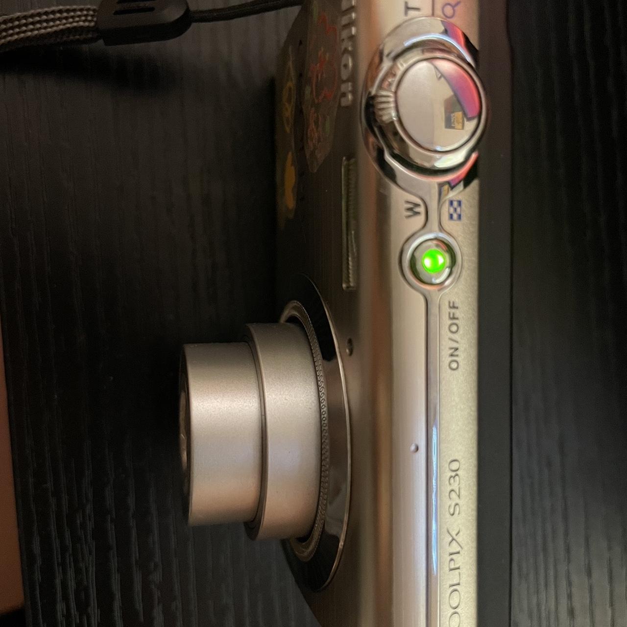 Silver Nikon Coolpix s230 digital camera touch... Depop