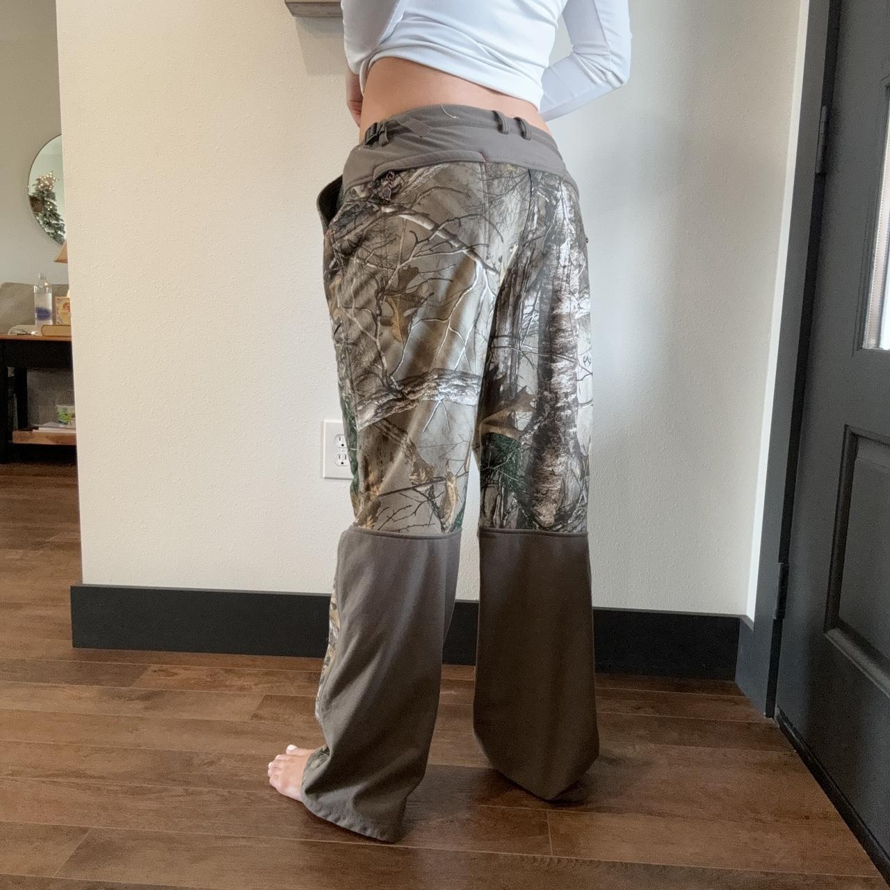 womens XL real tree camo pants. model is 5’9, with