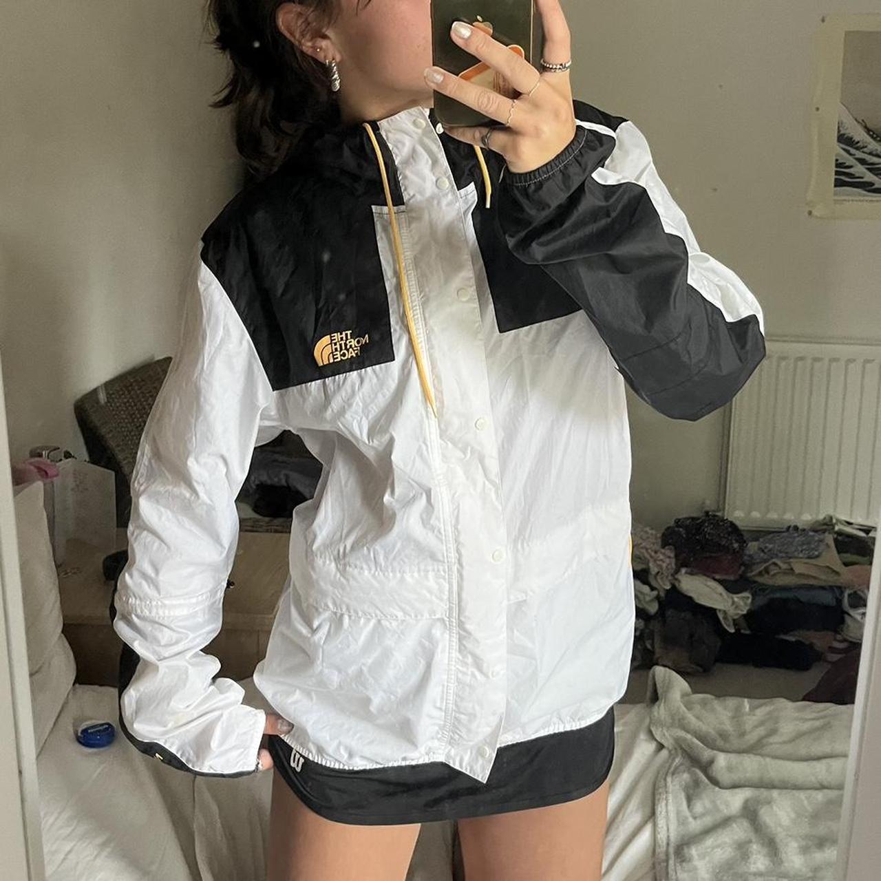 Black white and yellow North Face windbreaker. Depop