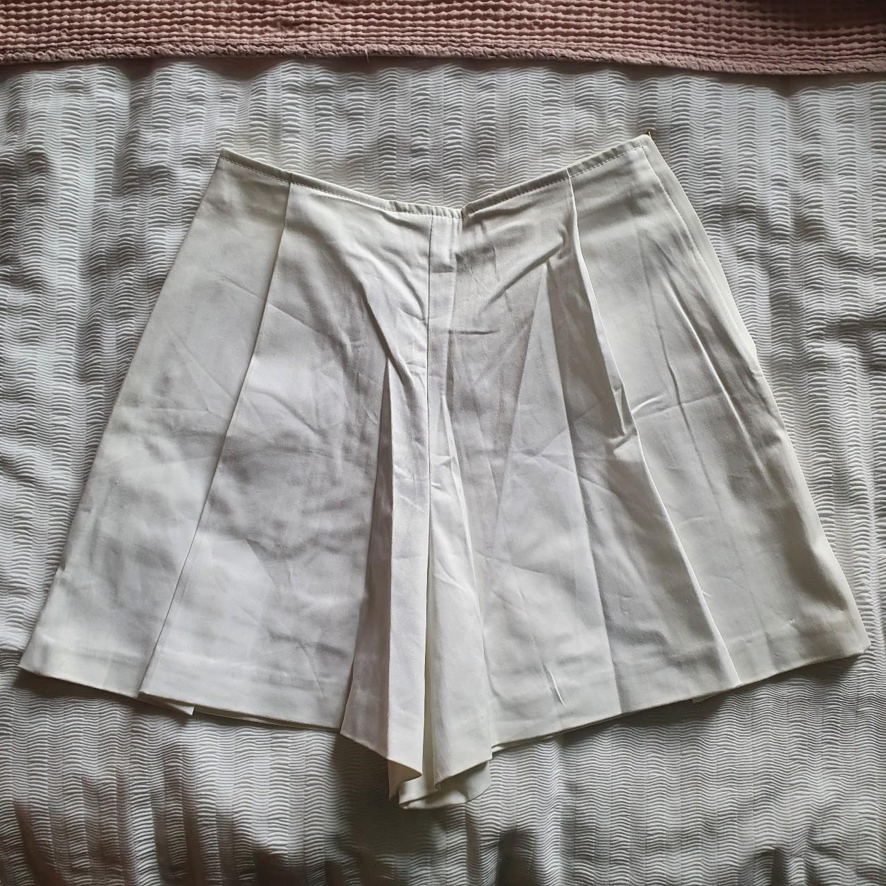 white pleated shorts / skort from a cottony... Depop