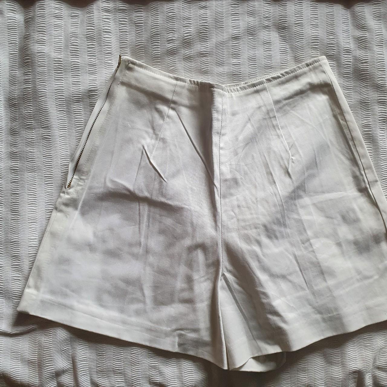 white pleated shorts / skort from a cottony... Depop