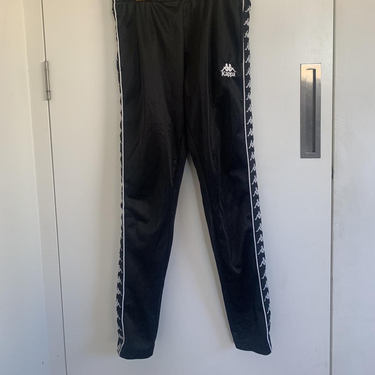 Kappa 1/4 button up track pants. Fits tight on a small - Depop