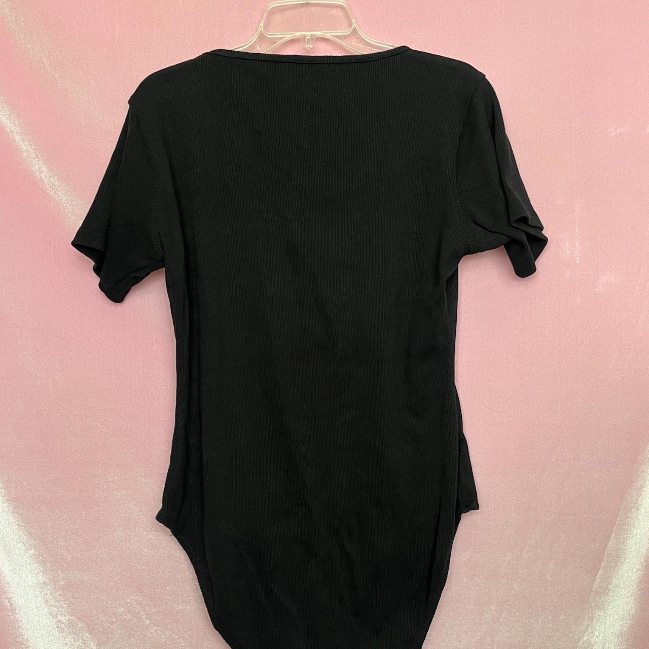 Plus Size Scoop Neck Ribbed Bodysuit from Nasty Gal