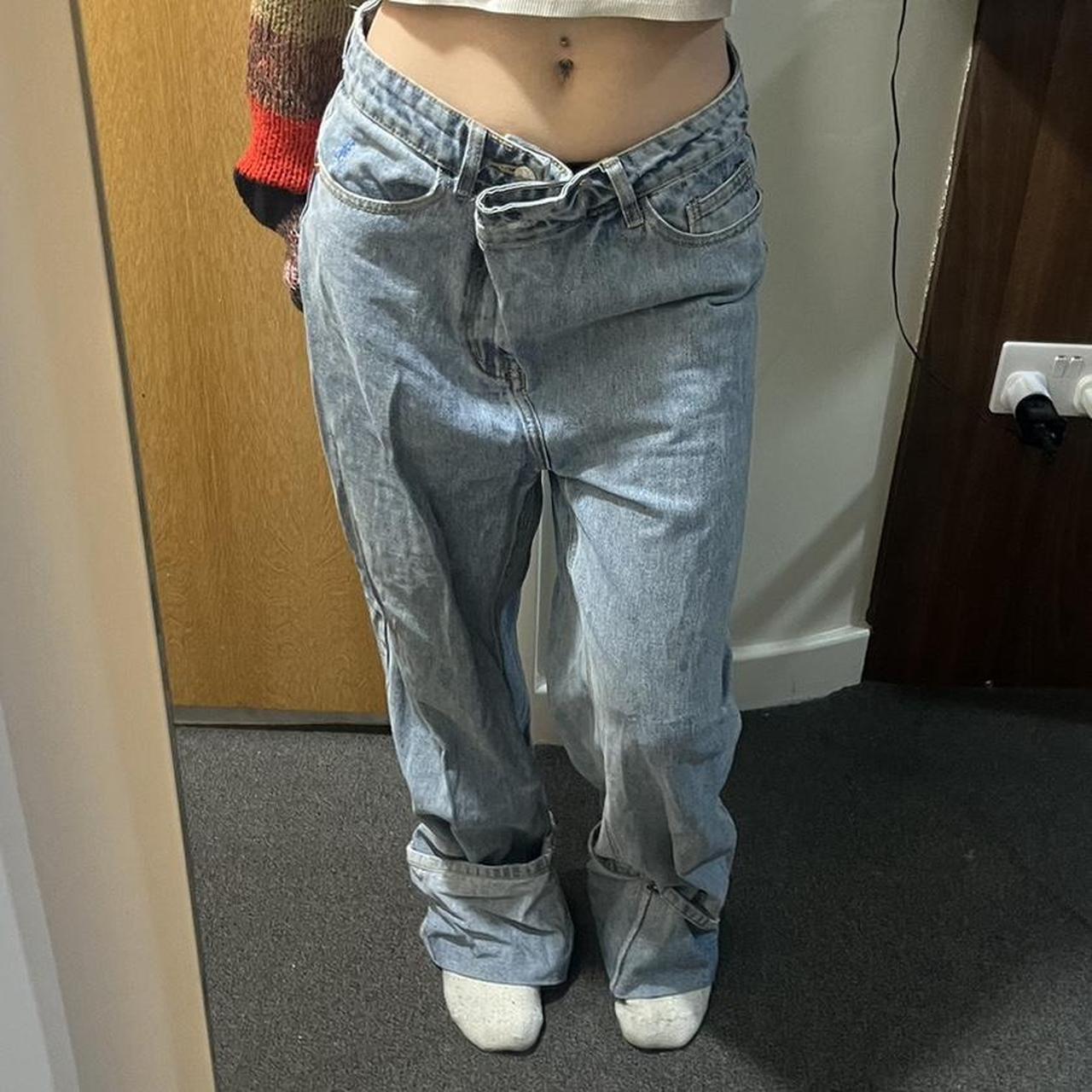 Super low waisted baggy jeans with button detail at... - Depop