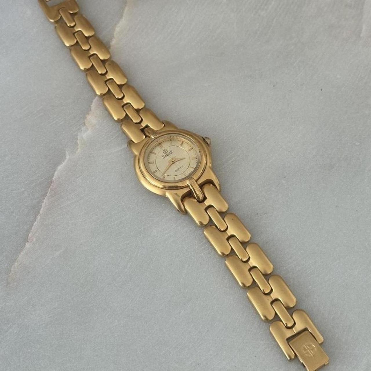 Swistar hotsell gold watch