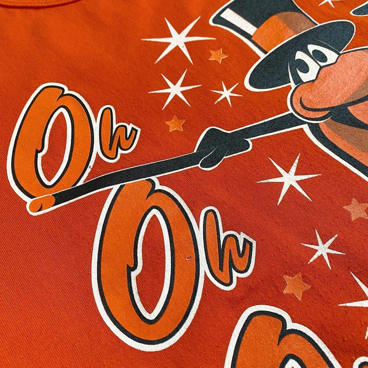 Orange Nike Dri-Fit Orioles t-shirt. The size is an - Depop