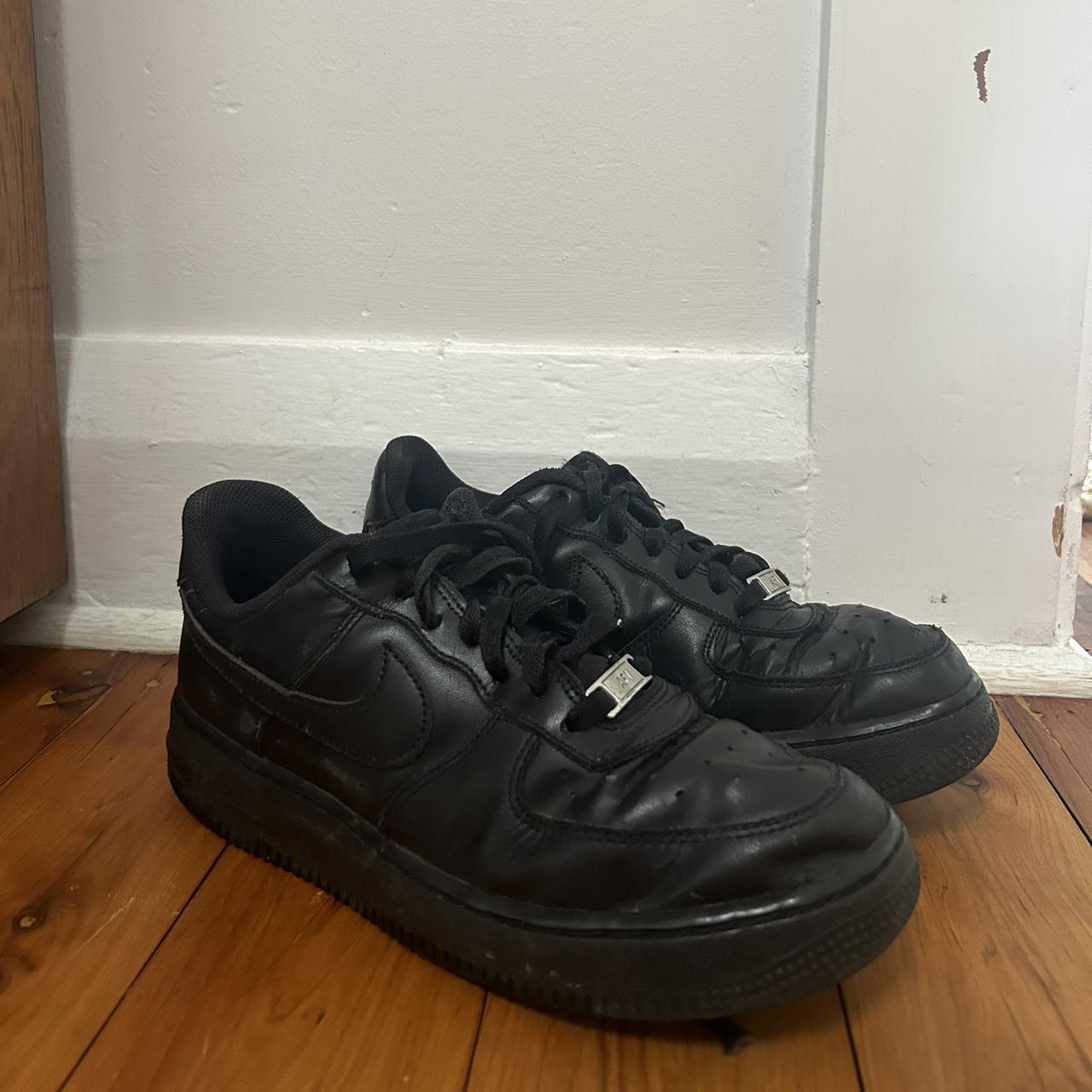 what does wearing black air force 1s mean