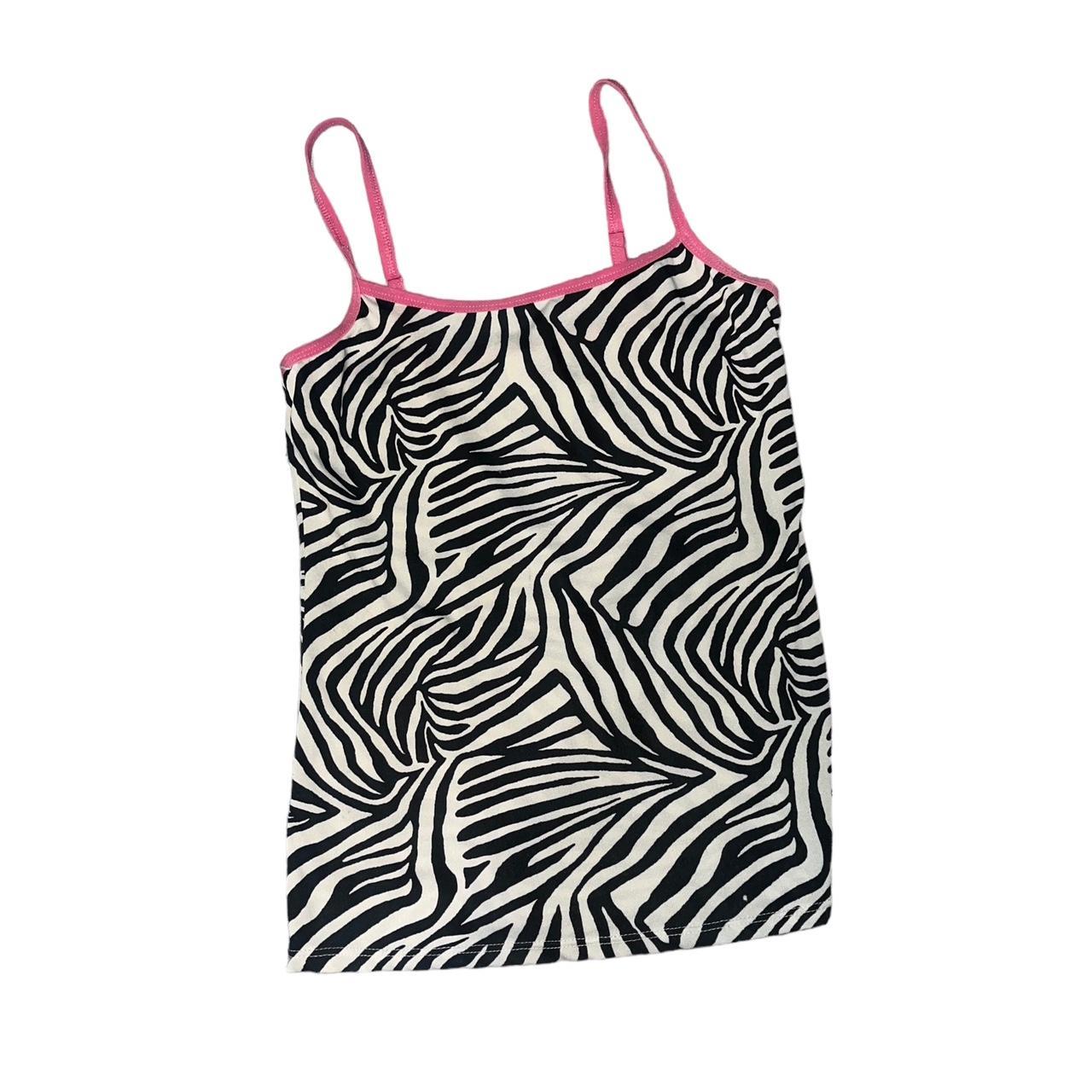 pink n black zebra tank fits like a medium tag... Depop