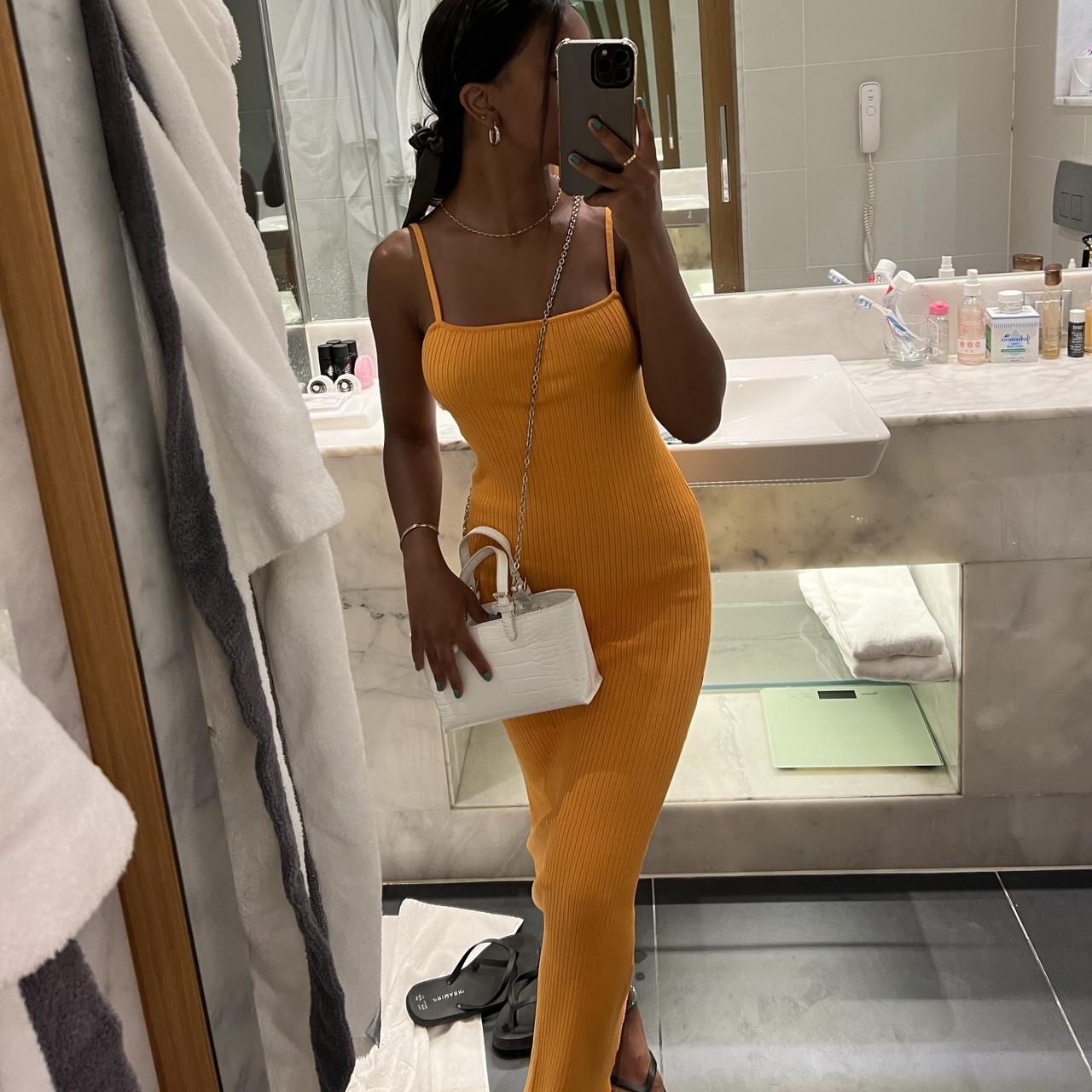 Orange ribbed knit dress in size SMALL with