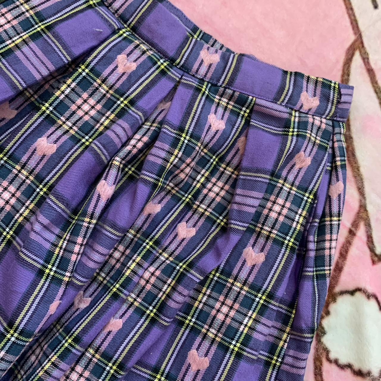 Purple and pink pleated skirt with little pink... - Depop