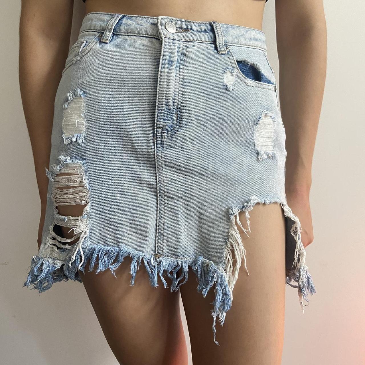 Supre Distressed light wash denim mini skirt size 10... - Depop