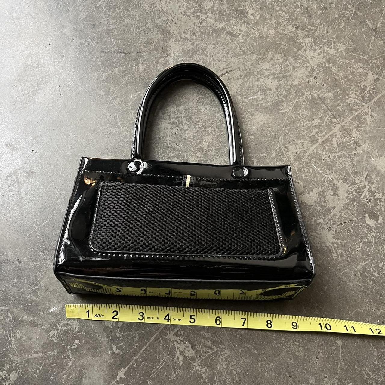 Black mini purse •so cute, holds a lot •button... Depop