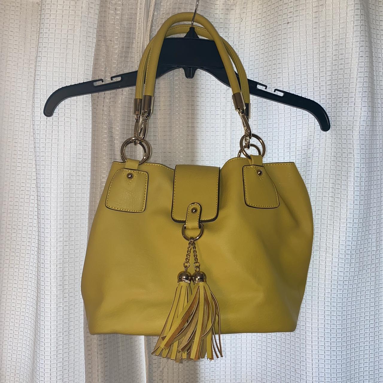 YELLOW CHARMING CHARLIE PURSE never used was