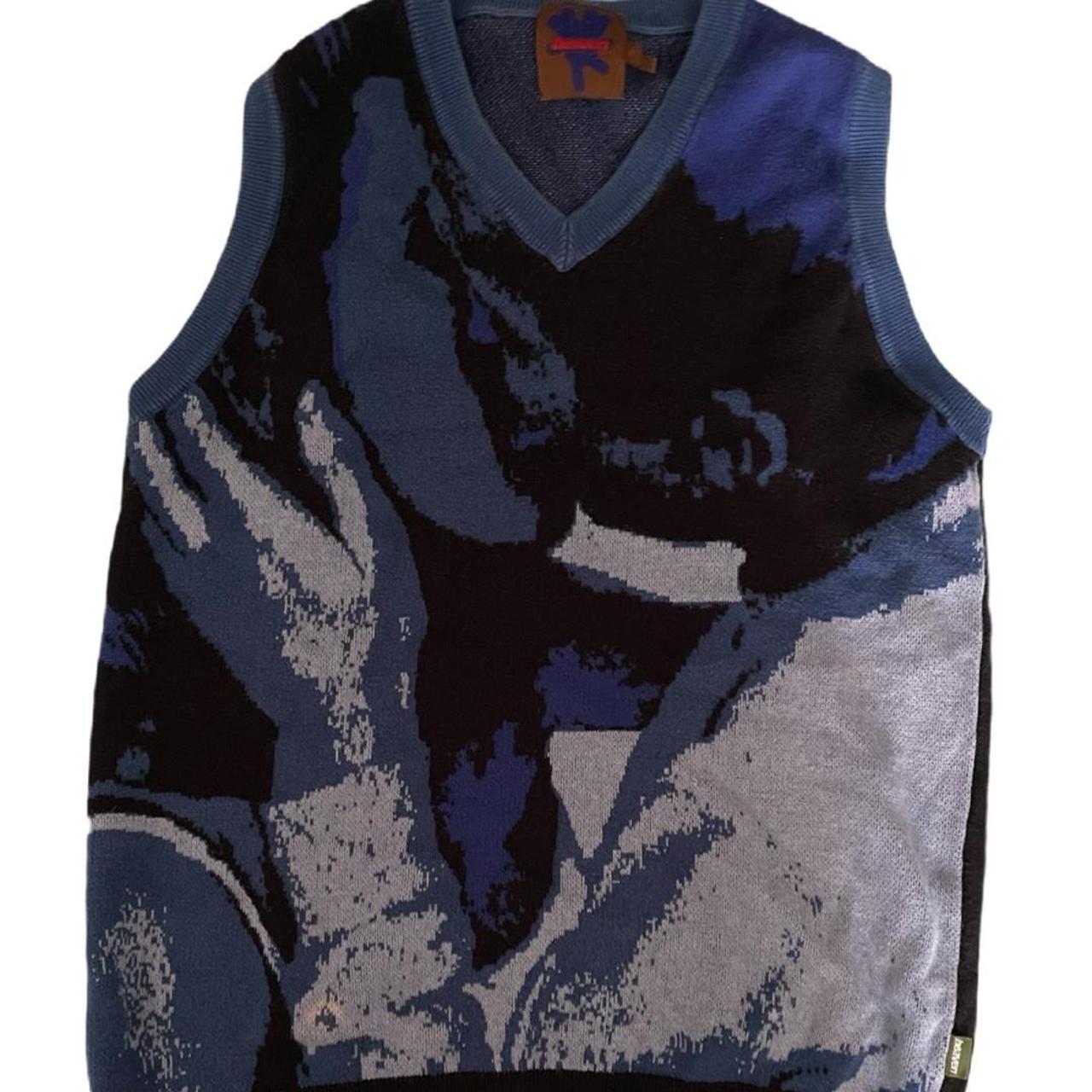 This ICONIC kissing blue vest from Heavn by Marc...