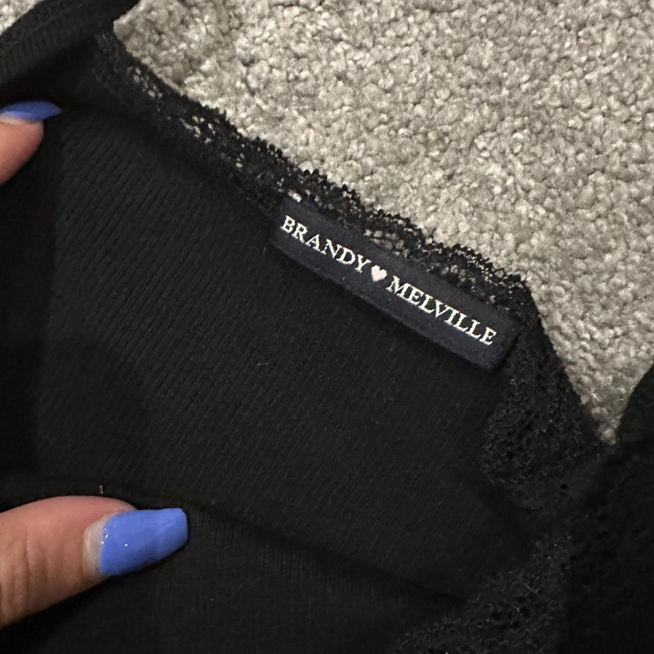 Brandy Melville dress in black with lace trimming... Depop