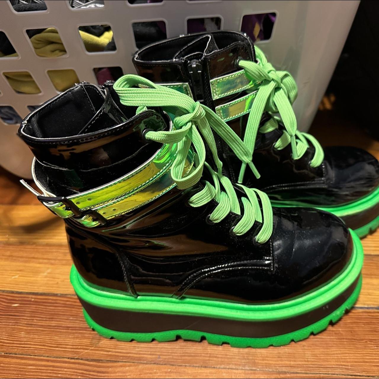 Demonia Women's Black and Green Boots | Depop