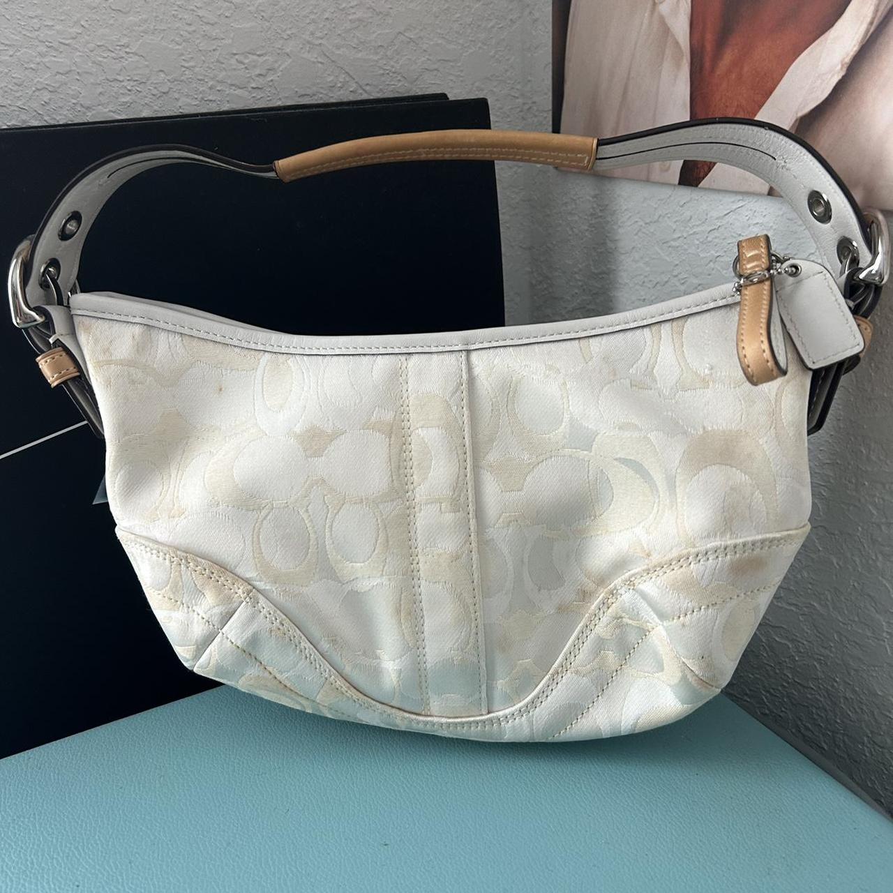 This coach bee mini purse is no longer sold in - Depop