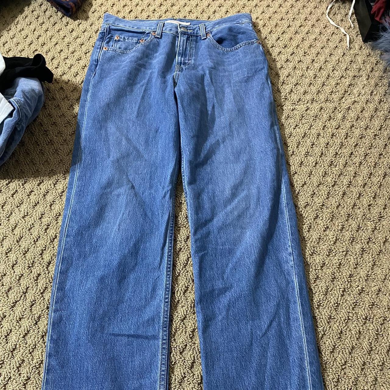 really cute baggy Levi jeans. fits mid rise and very... - Depop
