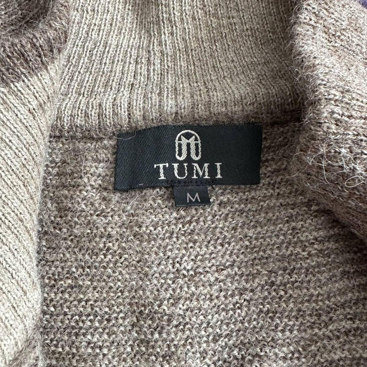 Tumi sweater 2025