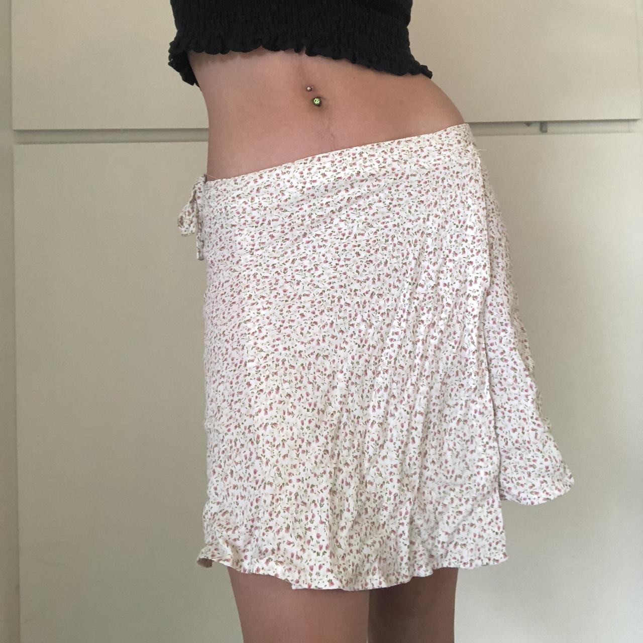 Really pretty wrap Brandy Melville floral skirt.... Depop