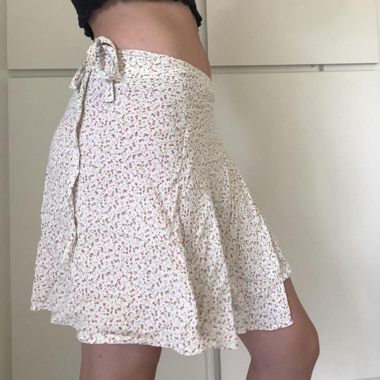 Really pretty wrap Brandy Melville floral skirt.... Depop