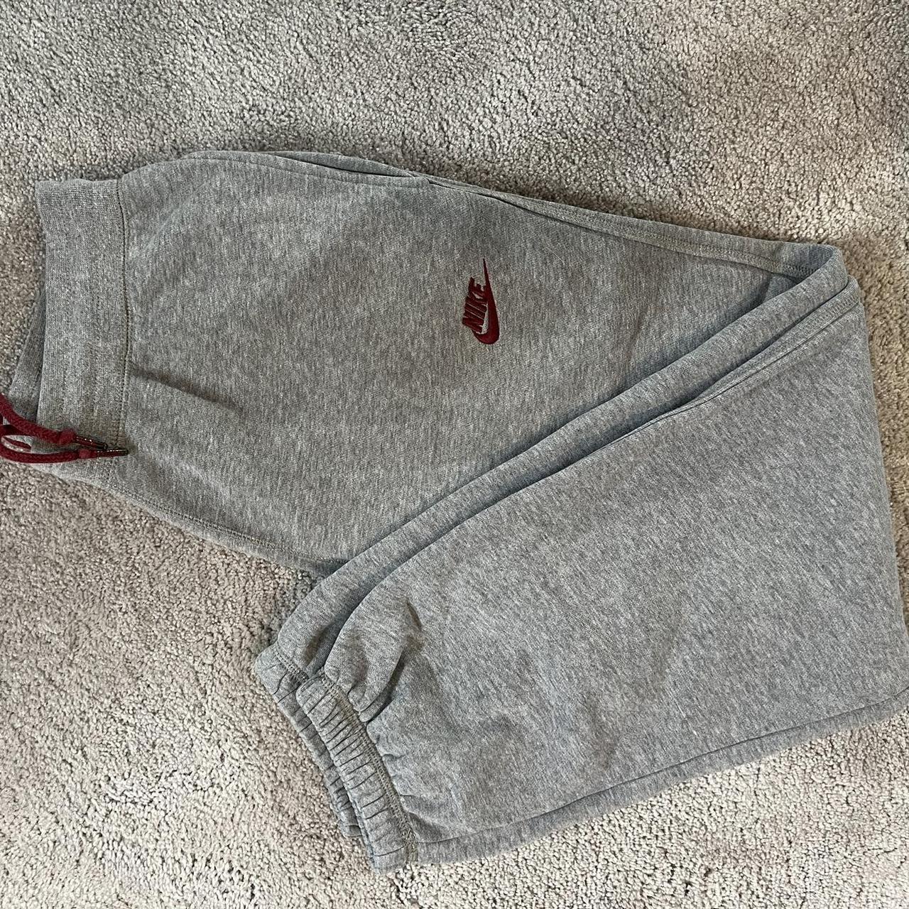 Grey Nike joggers Grey with red logo Size S Have Depop