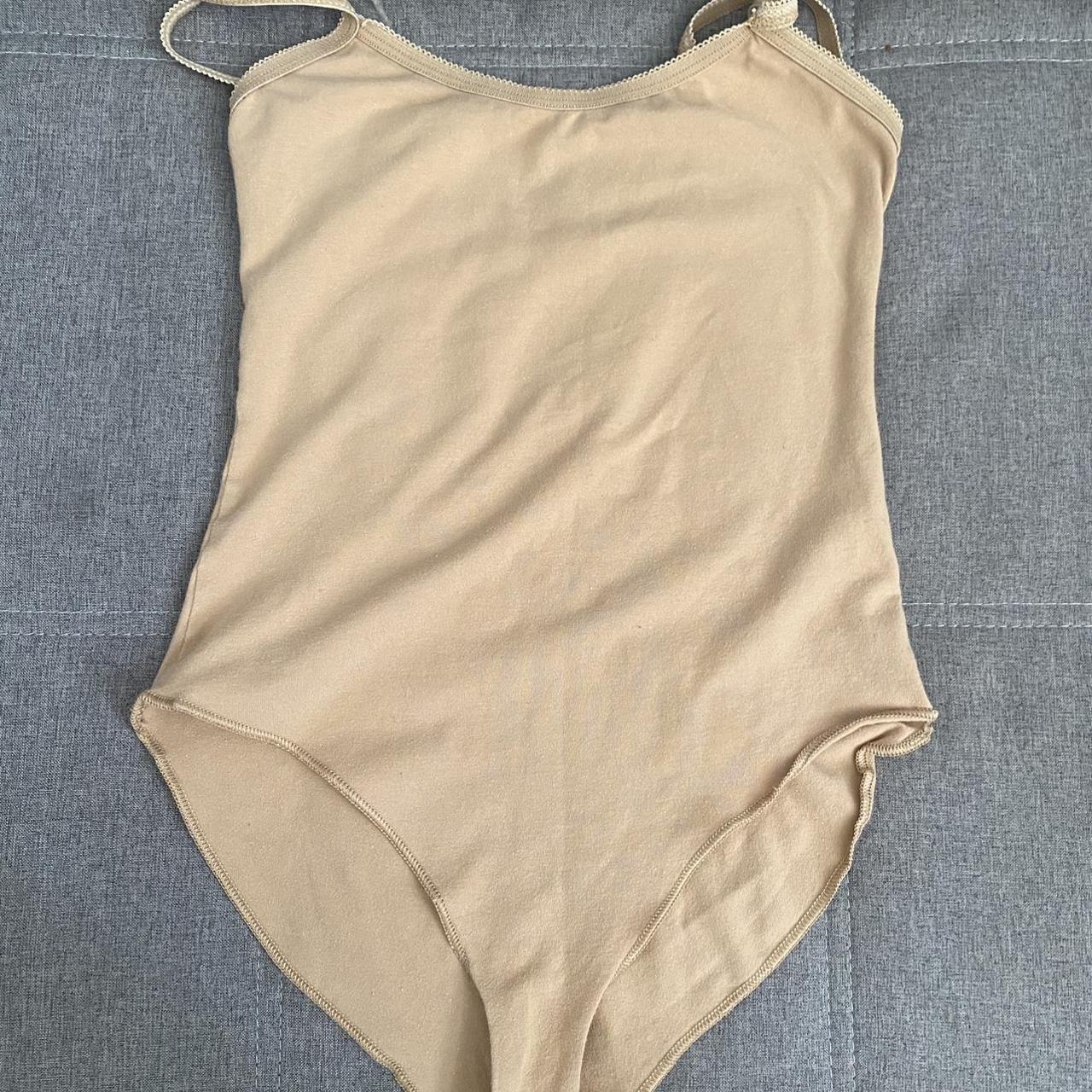 American Apparel nude bodysuit. Perfect to wear for... - Depop