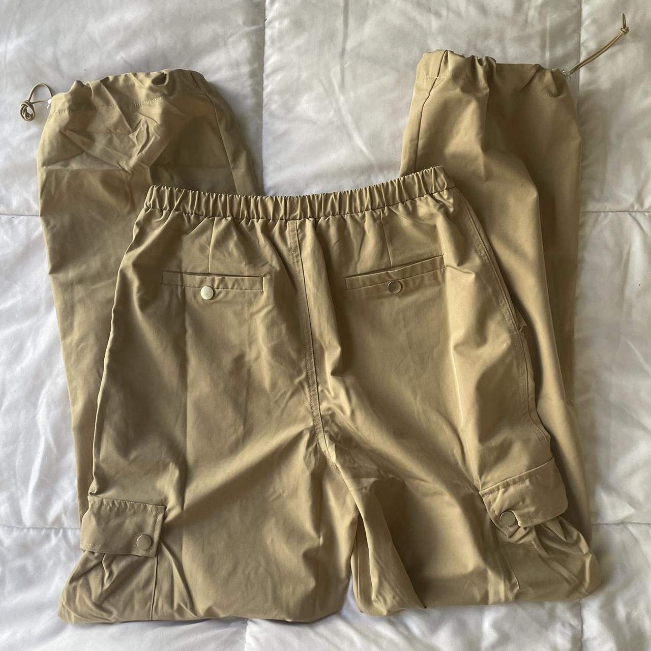 Emory Park Women's Tan and Cream Trousers | Depop