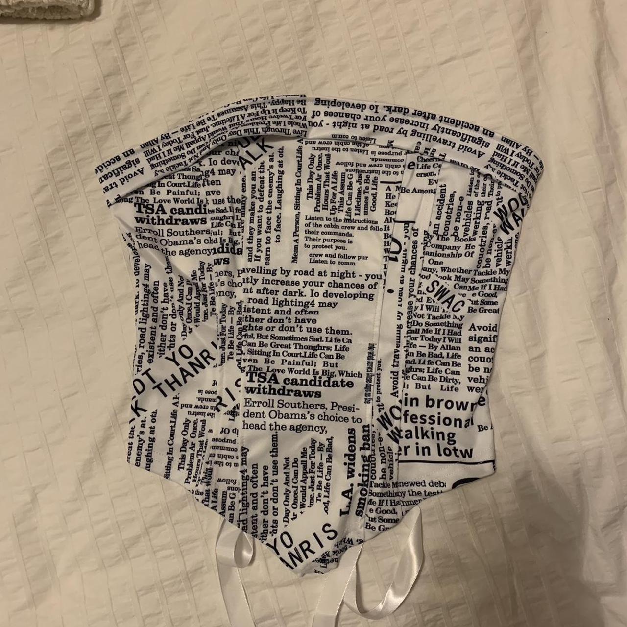 super cute newspaper print corset top very stretchy... Depop