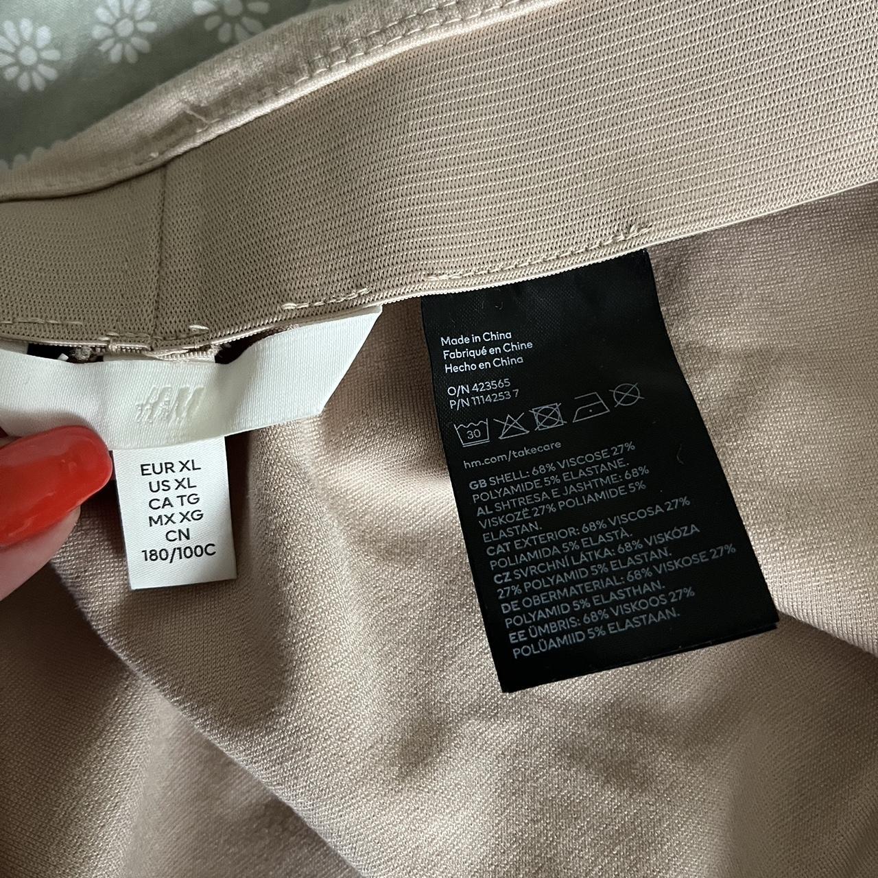 H&M beige skirt with slit XL fits size 16-20 barely... - Depop