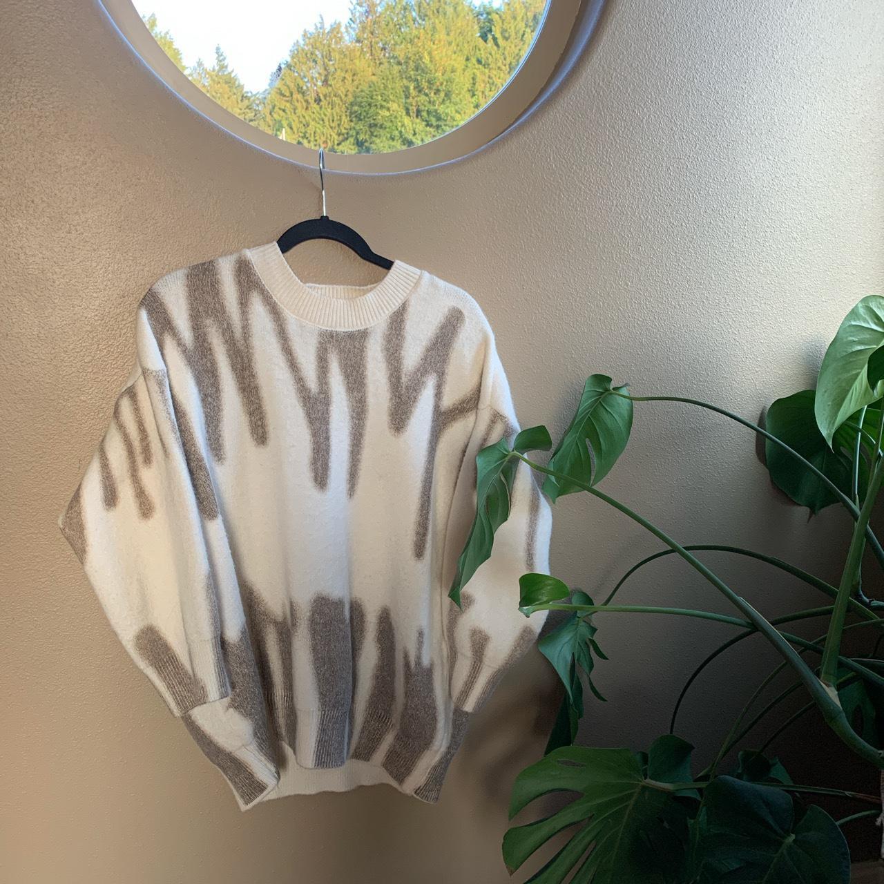 Verge Girl oversized beige sweater! This sweater is... Depop