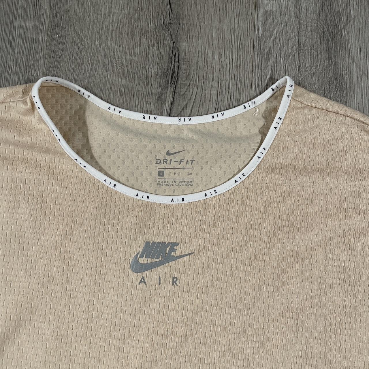 tan nike shirt womens